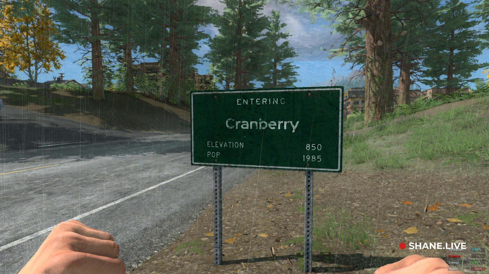 Originaler H1Z1-Screenshot von ShaneTSGTV am Ortsschild Cranberry im Regen